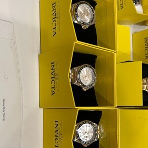 Invicta Two-Tone Silver and Gold Watch selling separately